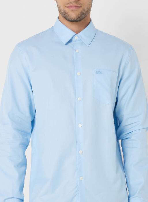 پیراهن اسلیم فیت مردانه لاکوست آبی مدل 7721