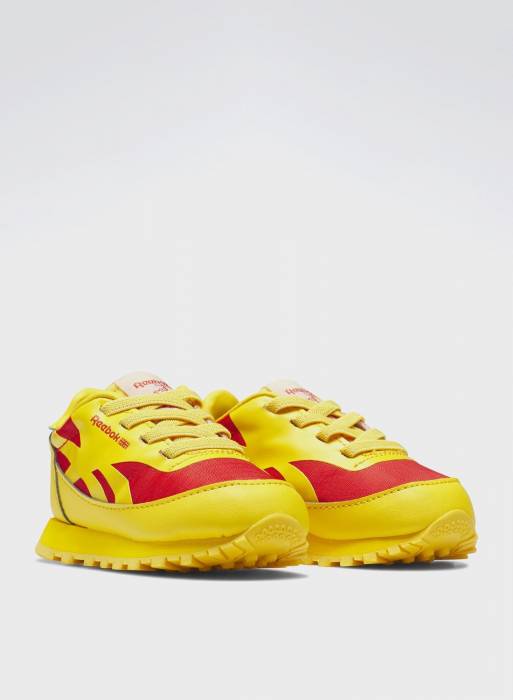 کفش اسپرت بچه گانه پسرانه ریباک زرد مدل 5730