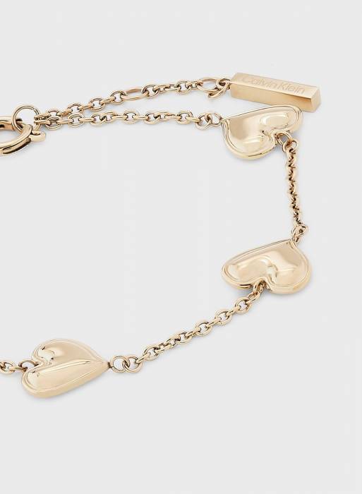 دستبند زنانه کلوین کلاین طلایی مدل 7789