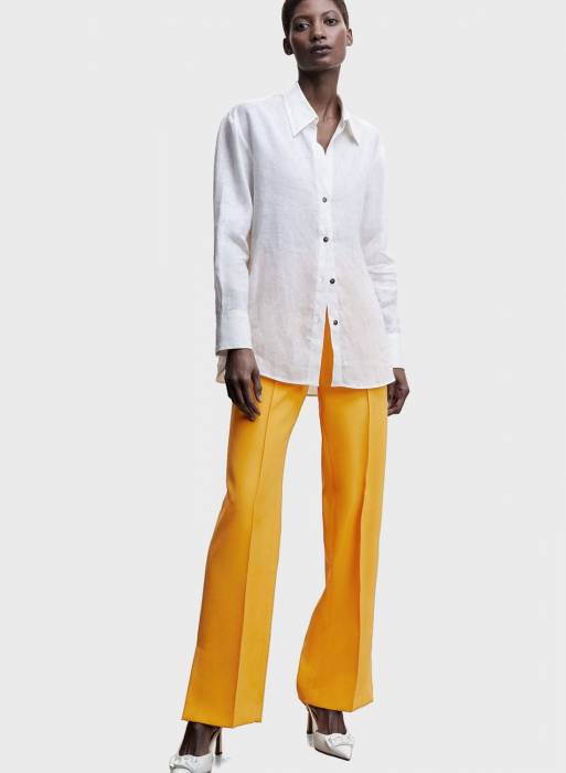 شلوار پارچه ای زنانه مانگو زرد مدل 9813