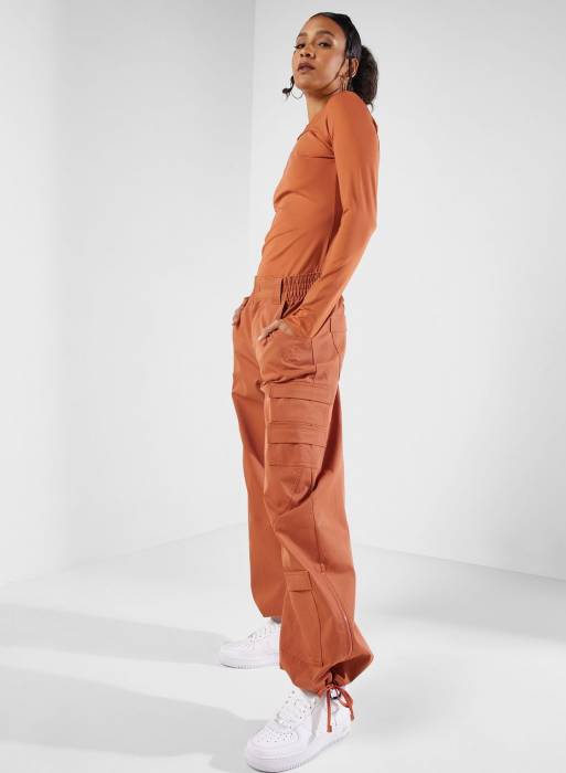 شلوار کتان زنانه نایک نارنجی مدل 3358