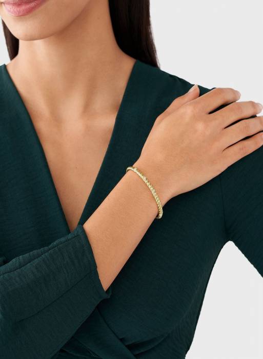 دستبند کلاسیک زنانه فسیل طلایی مدل 2366